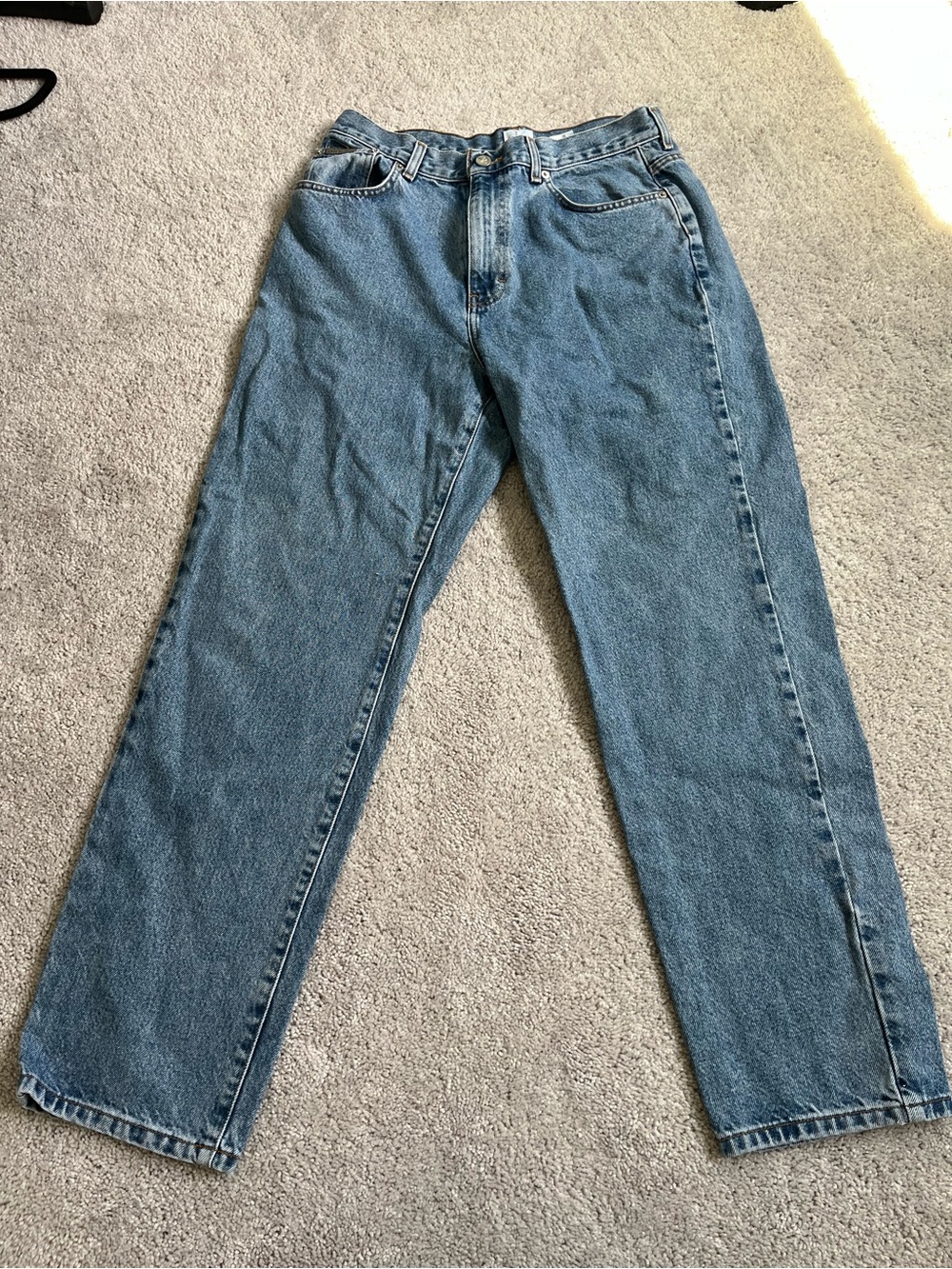 Calvin Klein Jeans Light Blue Relaxed Fit Denim with Brown Leather Patch